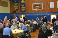 The men talk before the breakfast commences